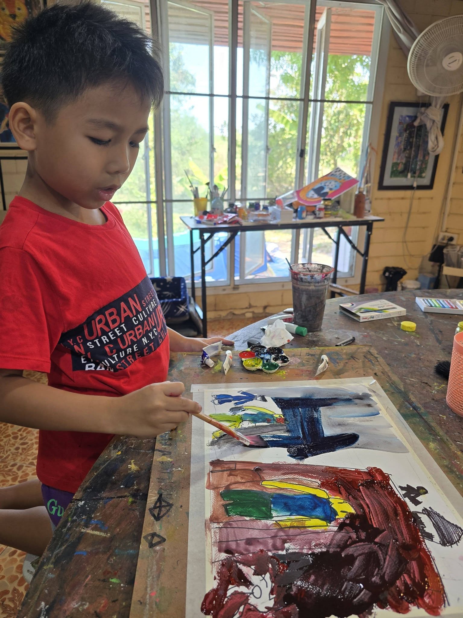 Captain at his art center near home